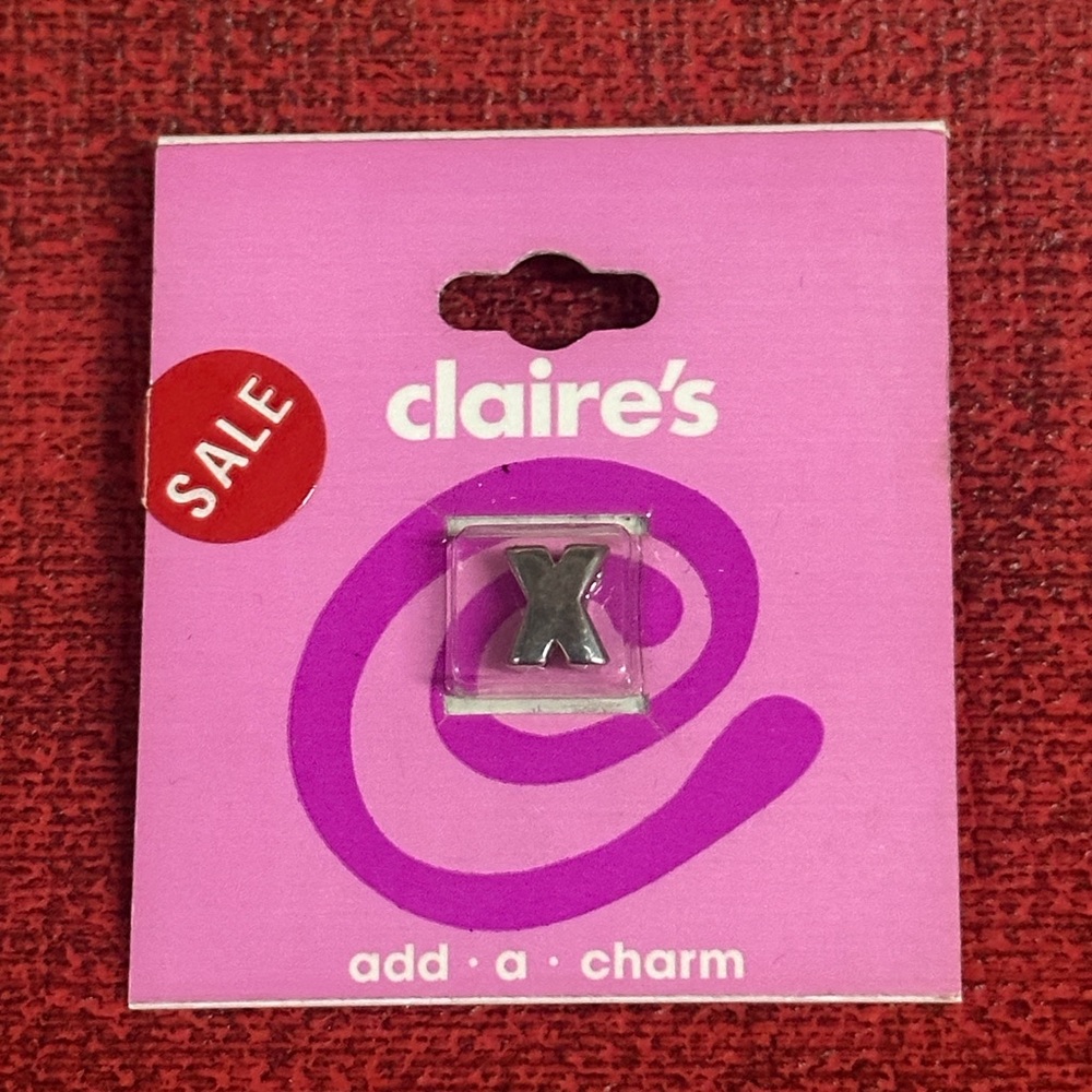 Claire's Elegant Silver Charm